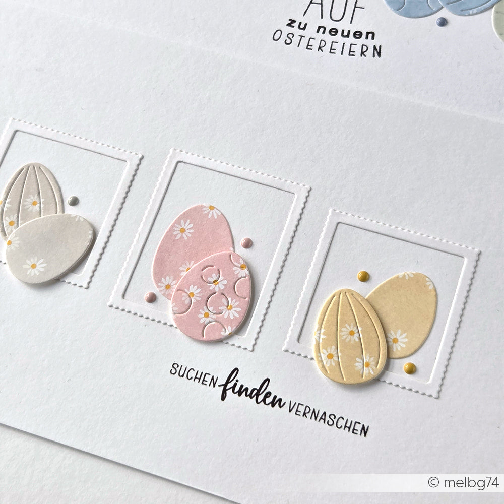 Drei pastellfarbene Ostereier in quadratischen Rahmen auf einer weißen Karte mit deutschem Text, hergestellt mit Alexandra Renke Motivstanze und passenden Designpapieren.