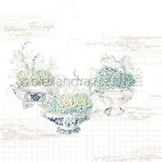 Drei verschnörkelte Schalen mit zarten weißen und hellgrünen Blüten, die an Alexandra Renkes Designpapier Hortensien erinnern, ruhen auf einem weißen Hintergrund mit zarter Schrift - perfekt für Papierprojekte oder Buchbinderei.