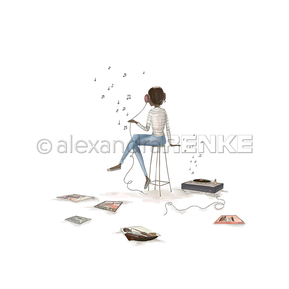 Ein Mädchen sitzt auf einem Hocker mit Kopfhörern, umgeben von Schallplatten, einem Player und Stapeln von buntem Alexandra Renke Designpapier - ideal für Papierprojekte und Buchbinderei.