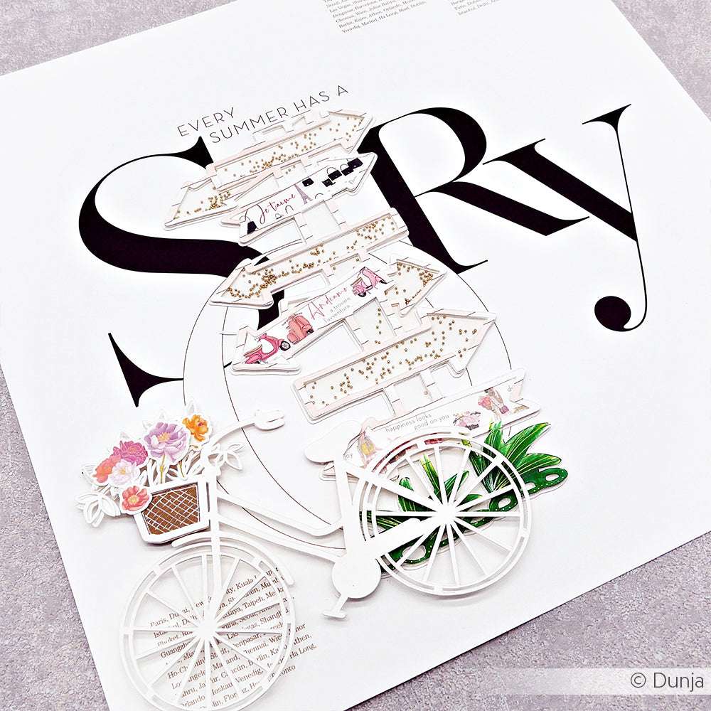 Ein ausgeschnittenes Fahrrad mit Blumen und Schildern, hergestellt aus dem farbenfrohen Alexandra Renke Designpapier, wird von einem fetten schwarzen Text mit der Aufschrift "STORY" überlagert.