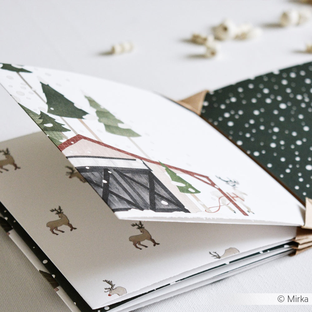 Designpapier 'Rentier vor Stall im Wald'