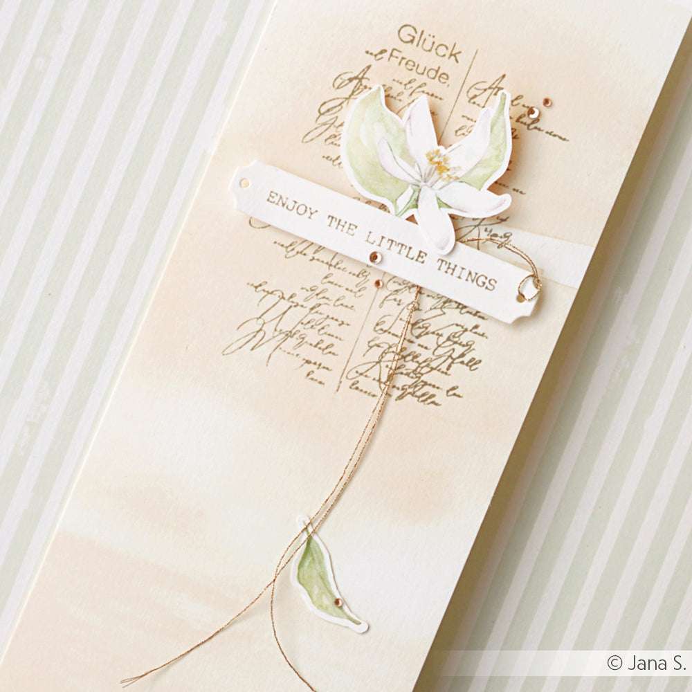 Handgefertigte Karte von Alexandra Renke mit floralen Motiven, Schriftzug und "ENJOY THE LITTLE THINGS" auf beigem Designpapier - ideal für Papierprojekte oder Bastelarbeiten in zarten Aquarell Zitronengelb-Tönen.