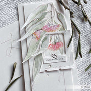 Handgefertigte Karte von Alexandra Renke mit aquarellierten Blumen, grünen Blättern und "Gute Besserung" auf strukturiertem weißem Designpapier - ideal für Papierprojekte, die einen eleganten Touch suchen.