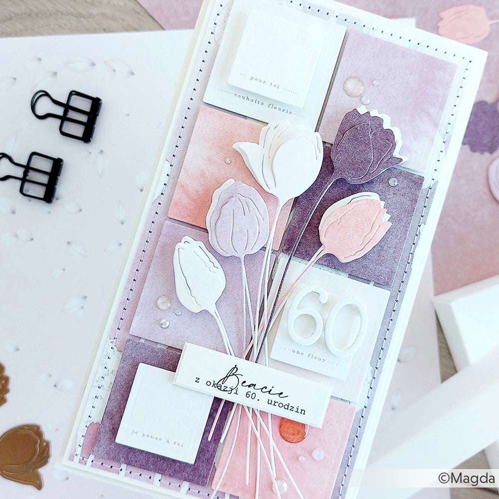 Eine handgefertigte Geburtstagskarte von Alexandra Renke mit pastellfarbenen Tulpen und "60" auf einem lila-rosa Patchwork, hergestellt mit exquisitem Designpapier - perfekt für Papierprojekte oder Buchbinderei.