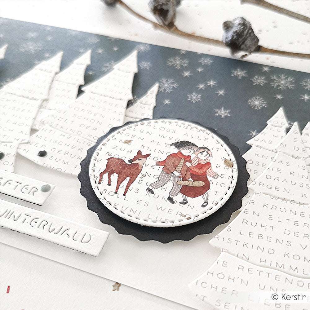 Handgemachte Winterkarte von Alexandra Renke mit Papierbäumen, Schneeflocken und zwei Personen mit einem Reh in der Mitte - ideal für winterliche Papierprojekte oder als einzigartige Grußkarte aus feinem Designpapier.