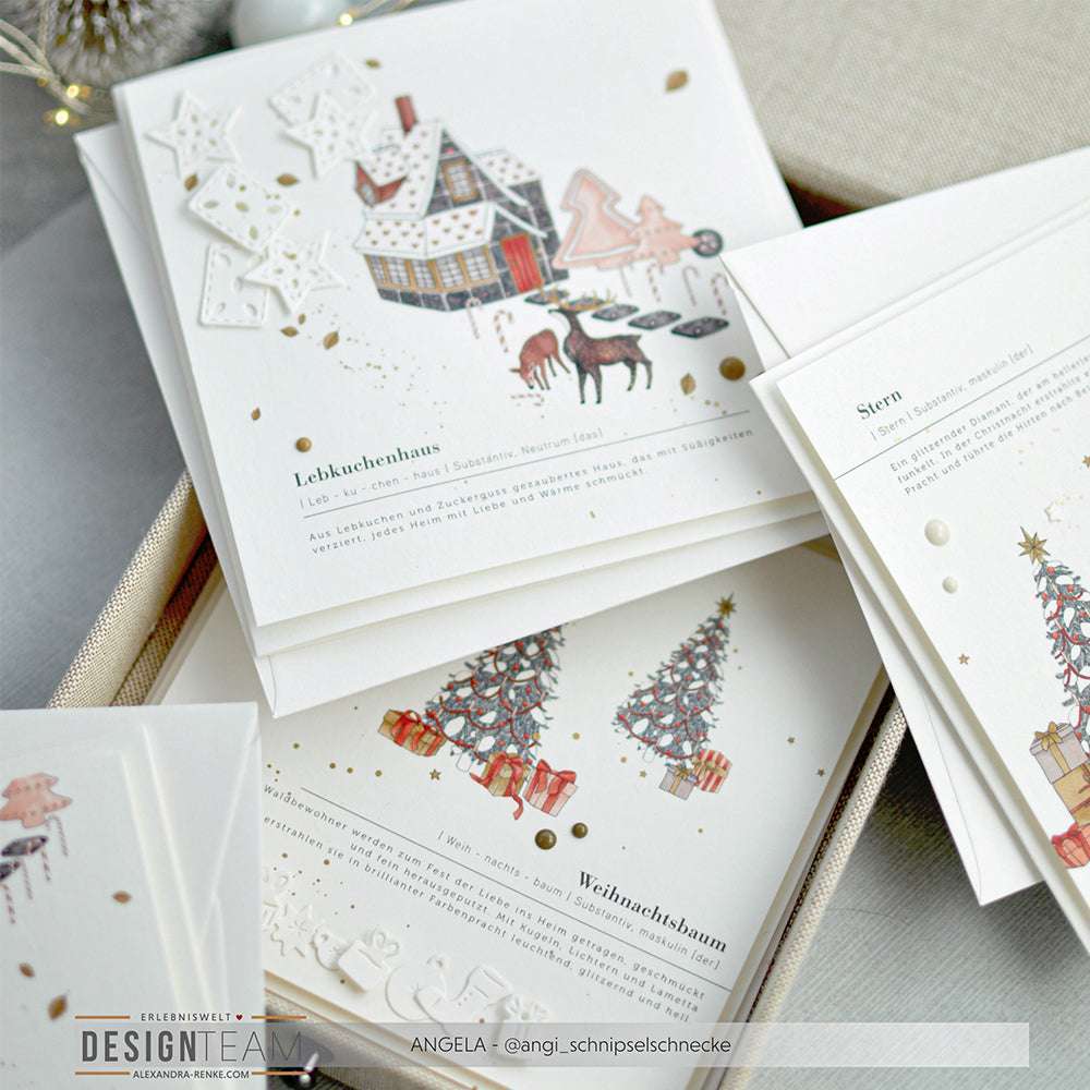 Ein Stapel Weihnachtskarten von Alexandra Renke mit festlichen Illustrationen wie einem Lebkuchenhaus, Rentieren und Weihnachtsbäumen - ideal für Papierprojekte oder zur Aufwertung mit einzigartigem Designpapier.