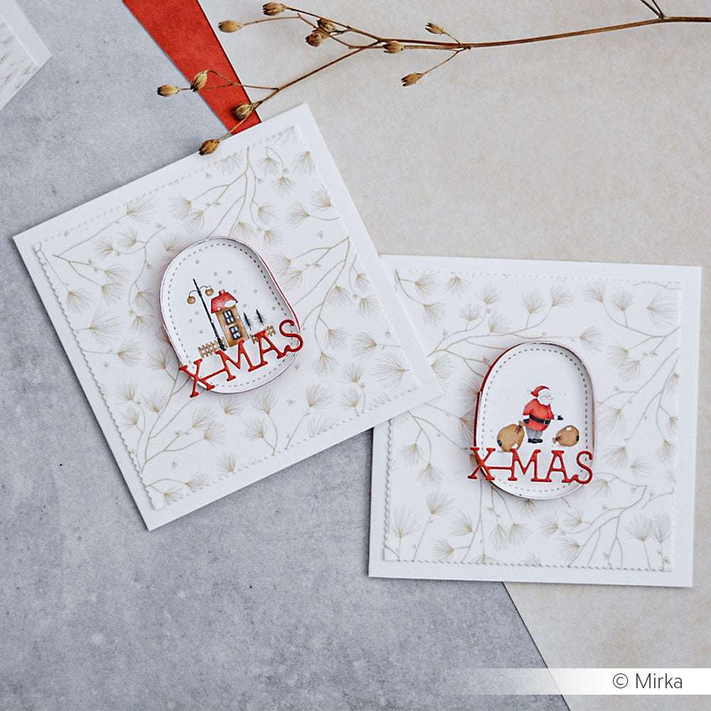 Zwei handgefertigte Weihnachtskarten von Alexandra Renke mit winterlichen Motiven und XMAS-Text auf strukturiertem weißen Hintergrund, hergestellt mit hochwertigem Designpapier für elegante Papierprojekte.
