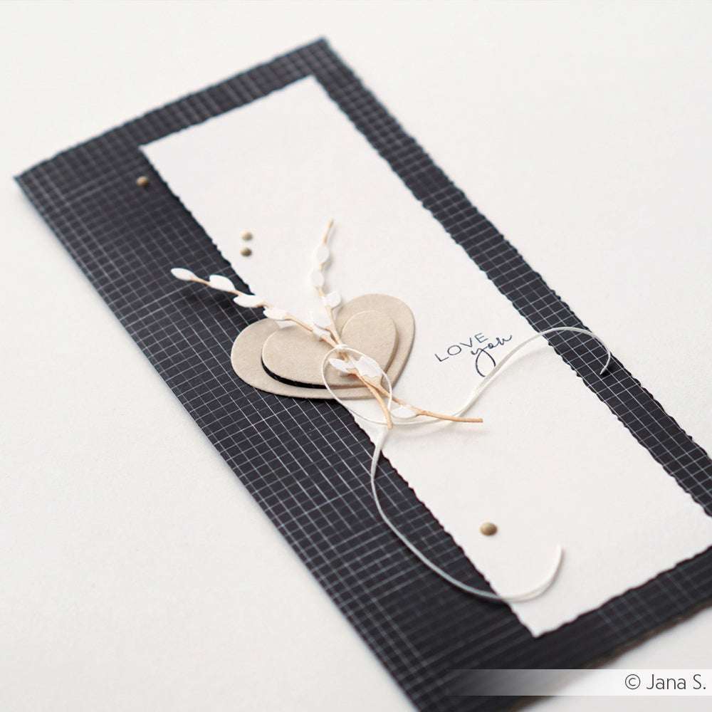 Handgefertigte Karte mit geschichteten Herzen, Kordel und "LOVE you"-Text auf Feines Karo Weiß auf Schwarz Designpapier von Alexandra Renke - ideal für Ihre Papierprojekte und in Premiumqualität gefertigt.