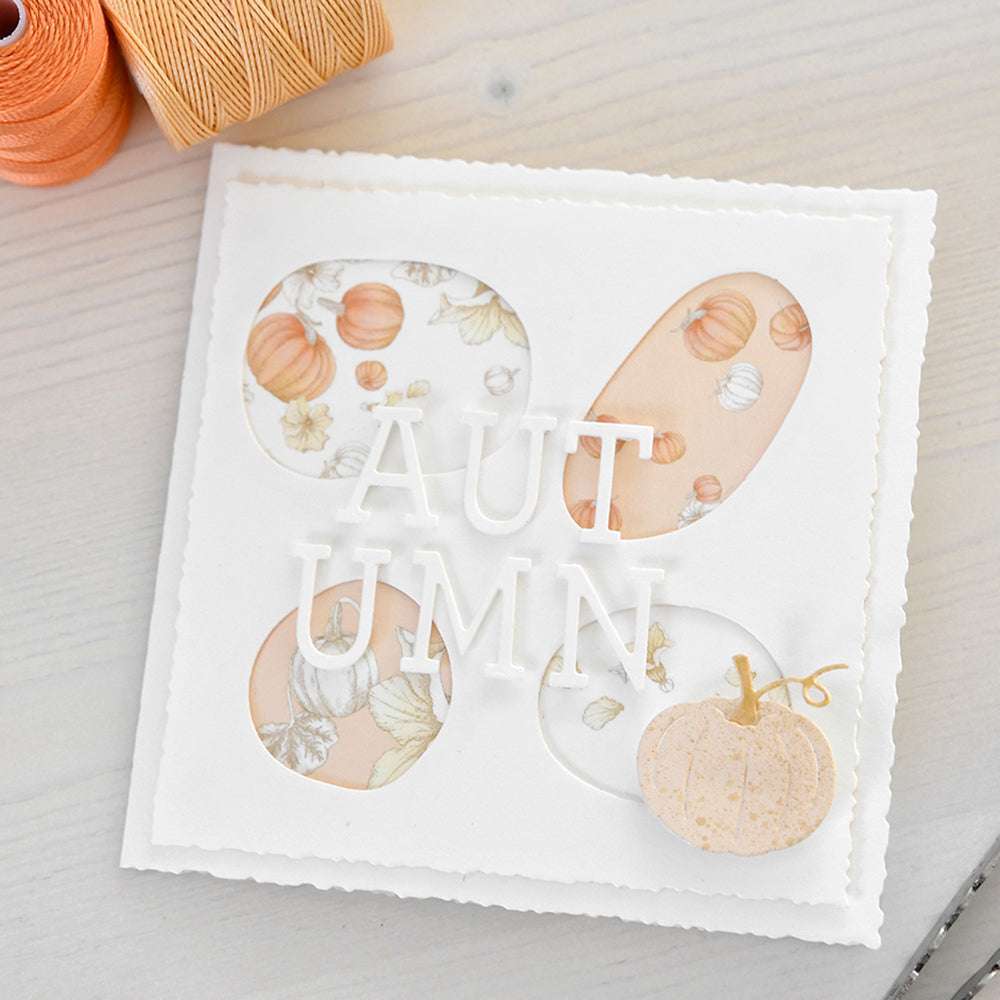 Quadratische Karte von Alexandra Renke mit dem Text "AUTUMN", Kürbismustern und einem kleinen Papierkürbis - ideal für Grußkarten oder saisonale Papierprojekte mit Ihrem Lieblingsdesignpapier.