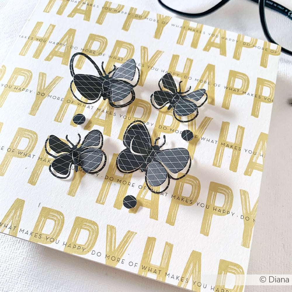Eine Karte von Alexandra Renke mit goldenem HAPPY-Text und vier schwarz-weißen 3D-Schmetterlingen - ideal für Papierprojekte oder Buchbinderei-Fans, die elegante Design-Inspiration suchen.