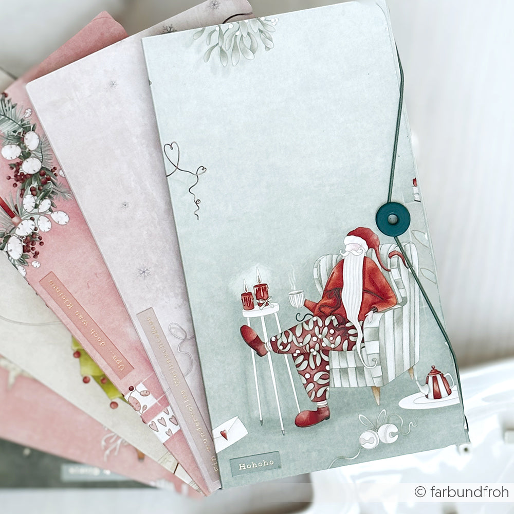 Drei festliche Weihnachtskarten von Alexandra Renke, darunter eine mit dem Weihnachtsmann im Sessel, inspirieren zu kreativen Projekten für die Weihnachtszeit - ideal für Fans von Designpapier Weihnachten und charmanten Weihnachtsfiguren.