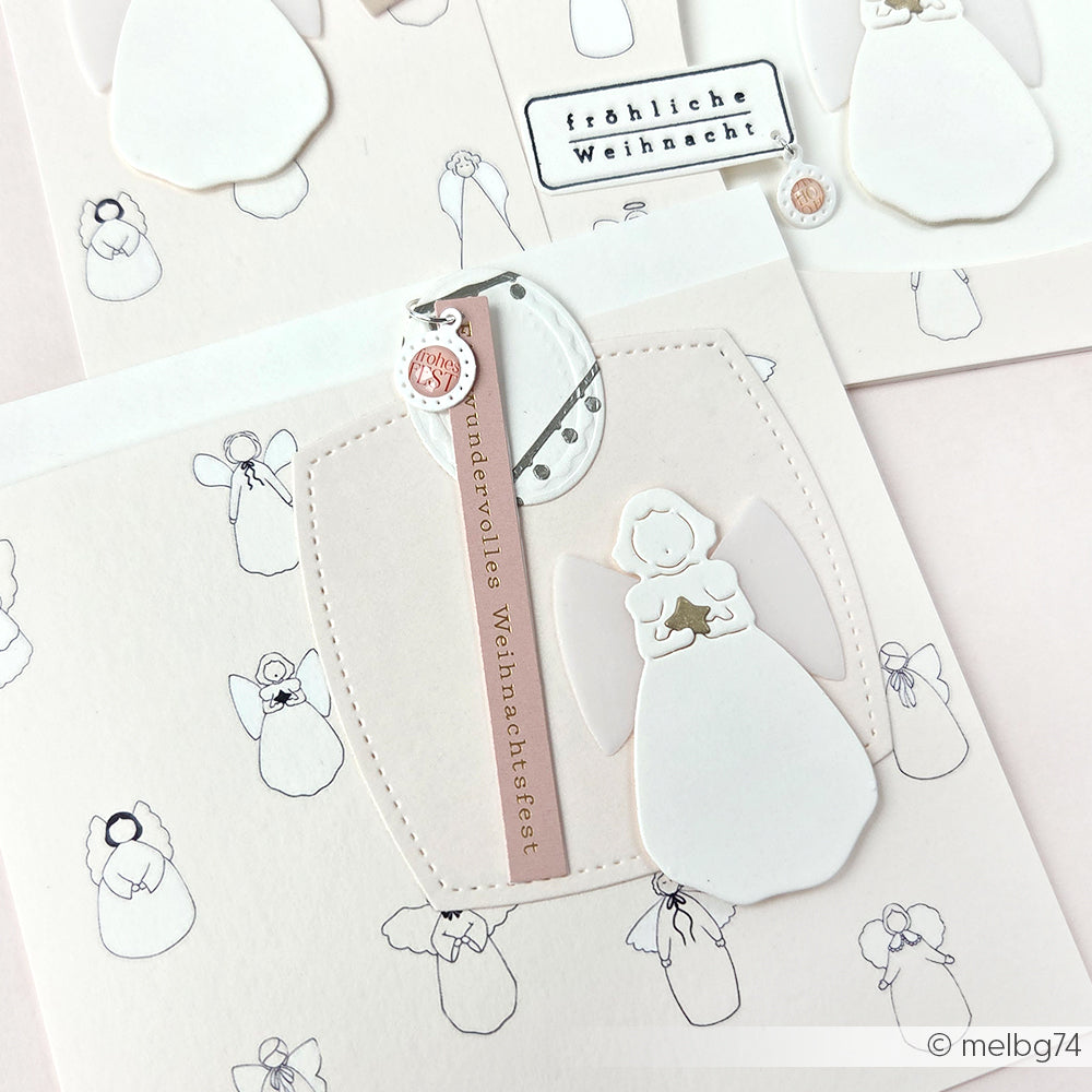 Handgefertigte Weihnachtskarten von Alexandra Renke mit schlichten Engelmotiven auf weißem Designpapier, mit deutschen Weihnachtsgrüßen - ideal für festliche Papierprojekte und einzigartige Weihnachtsgeschenke.