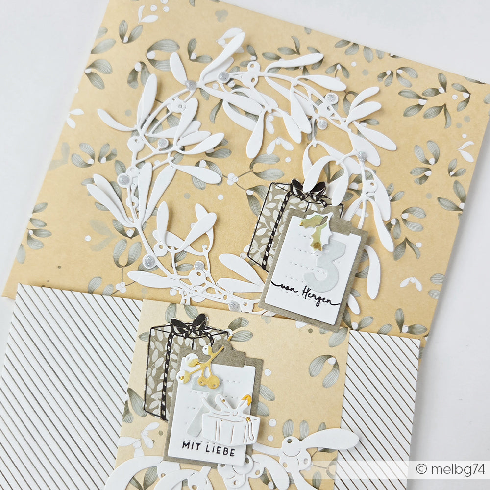 Handgefertigte Karte mit ausgestanzten Mistelzweigen und deutschem Text zum dritten Adventssonntag, gestaltet mit Designpapier.
