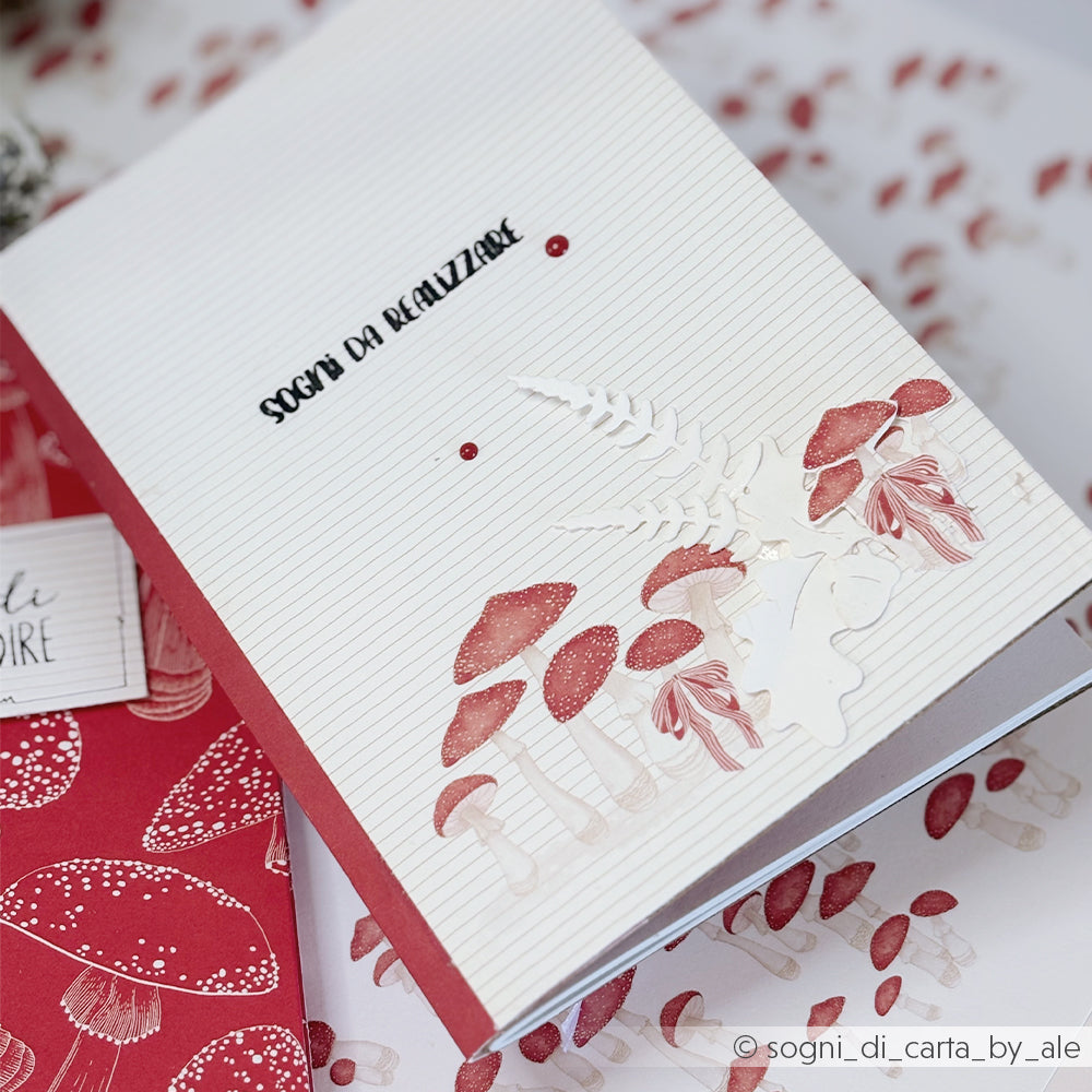 Notizbuch mit Pilzillustrationen und dem Text Sogni da realizzare für papierprojekte.