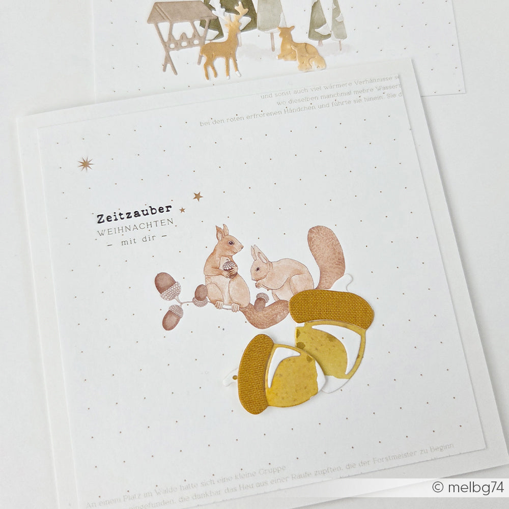 Grußkarte mit zwei Eichhörnchen auf einem Ast und Eicheln, ideal passend zum Designpapier Eichhörnchen.