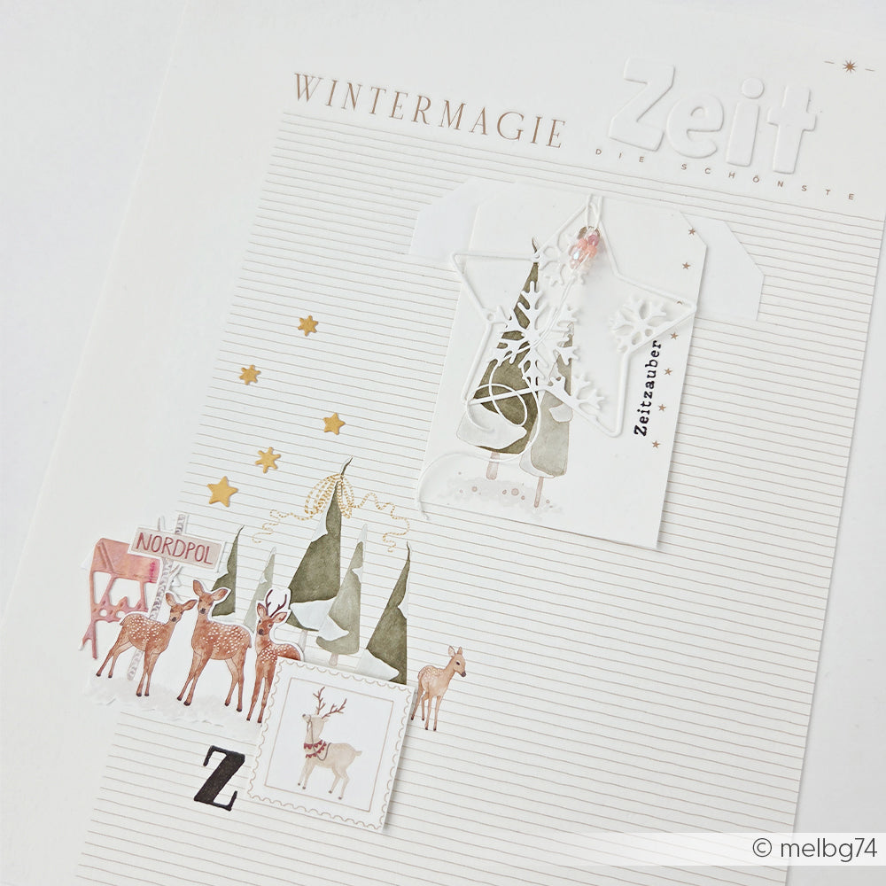 Eine Scrapbook-Seite zum Thema Winter mit Rehen, einem Tannenwald und dem Nordpol, gestaltet auf Wintermagie-Papier.