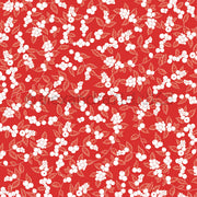 Roter Designpapier-Hintergrund mit einem sich wiederholenden Muster aus weißen Strauchbeeren und Blättern.