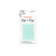 Eine Packung mit neun mintfarbenen Planner Discs von Crate Paper in einer durchsichtigen Verpackung mit der Aufschrift Day-to-Day von Maggie Holmes.