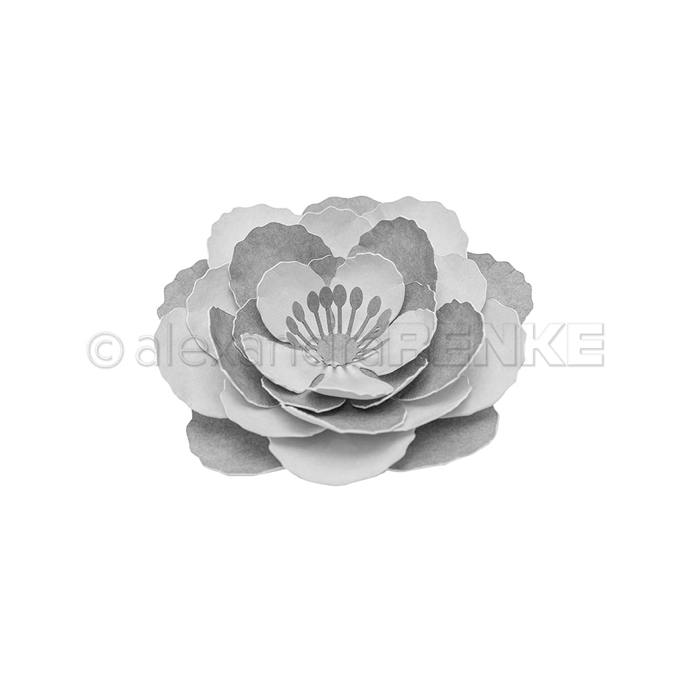 Graue Papierblume mit mehrschichtigen Blütenblättern und einer detailreichen Mitte, gefertigt mit dem 3D-Stanzsystem „Motivstanze 3D Wolkenrose“ von Alexandra Renke und hochwertigen Designpapieren, präsentiert auf weißem Hintergrund.