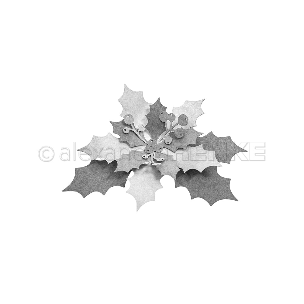 Ein mehrschichtiger Papierschnitt einer Weihnachtssternblüte mit 3D-Blättern und Beeren der Stechpalme (Ilex).