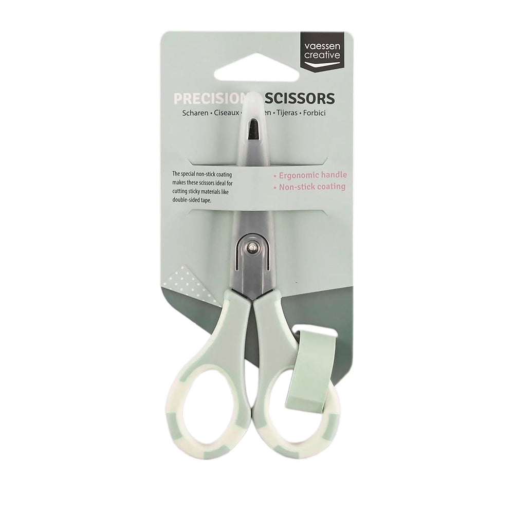 Vaessen Präzisionsschere mit ergonomischem Griff in grün-weißer Verpackung, ideal fürs Scrapbooking und dank Antihaftbeschichtung für müheloses Schneiden.