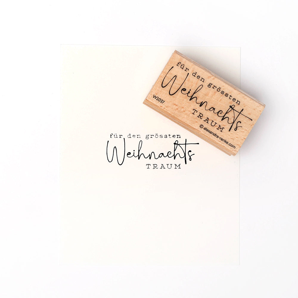 Ein Alexandra Renke Weihnachtsstempel aus Holz mit deutschem Text: "Für den größten Weihnachtstraum" in schwarzer Schrift. Ideal, um Ihre Weihnachtsbasteleien mit festlichen Stempelmotiven zu versehen.