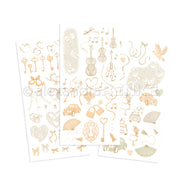 Drei Bögen mit goldenen und silbernen Deko-Stickern von Alexandra Renke mit Schlüsseln, Musikinstrumenten, Herzen und Vintage-Motiven - ideal für Bastelprojekte oder zur Verschönerung Ihrer Rub-On Transferfolien.