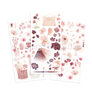 Drei Bögen Alexandra Renke Rub-On-Aufkleber mit rosa, lila und beigen Blumen, Pflanzen und Vintage-Objekten - ideal für Bastelprojekte oder um Ihren Bastelarbeiten einen charmanten Touch zu verleihen.