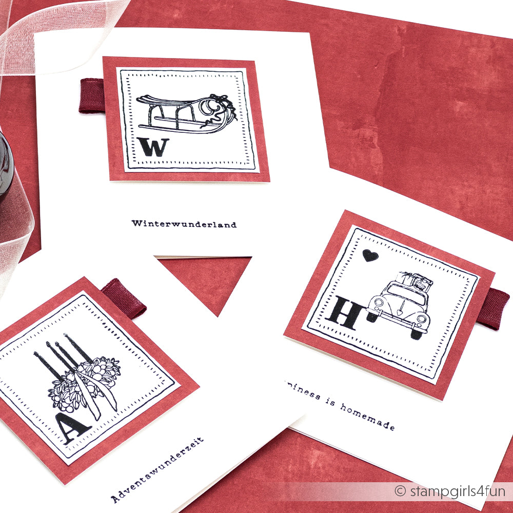 Drei handgefertigte Winterkarten von Alexandra Renke zeigen schwarz-weiße Zeichnungen im Vintage-Stil mit rotem Rand. Clear Stamp Techniken und Komposition Xmas at home Themen verleihen diesen festlichen Photopolymer-Kreationen einen einzigartigen Charme.