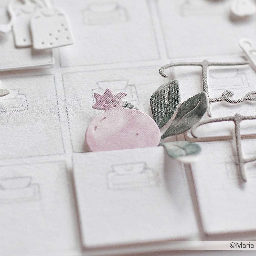 Eine pastellrosa Granatapfel-Illustration mit grünen Blättern auf weißem, strukturiertem Hintergrund von Alexandra Renke, perfekt für Designpapiere oder kreative DieCut Systeme Projekte.