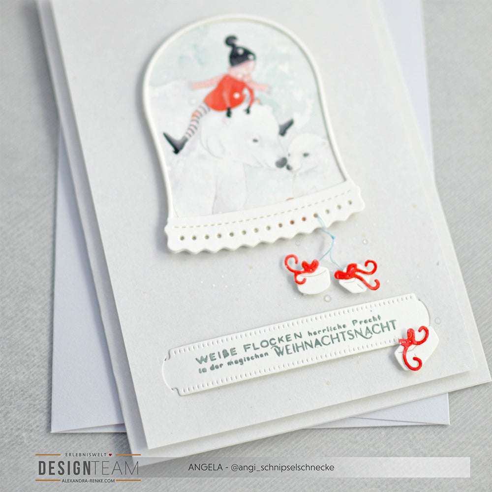 Handgefertigte Karte von Alexandra Renke mit einem Mädchen auf einem Eisbären in einer Schneekugel, deutschem Text, roten Schleifen auf Motivstanze Kurze Steck-Etiketten, gefertigt aus feinen Designpapieren.