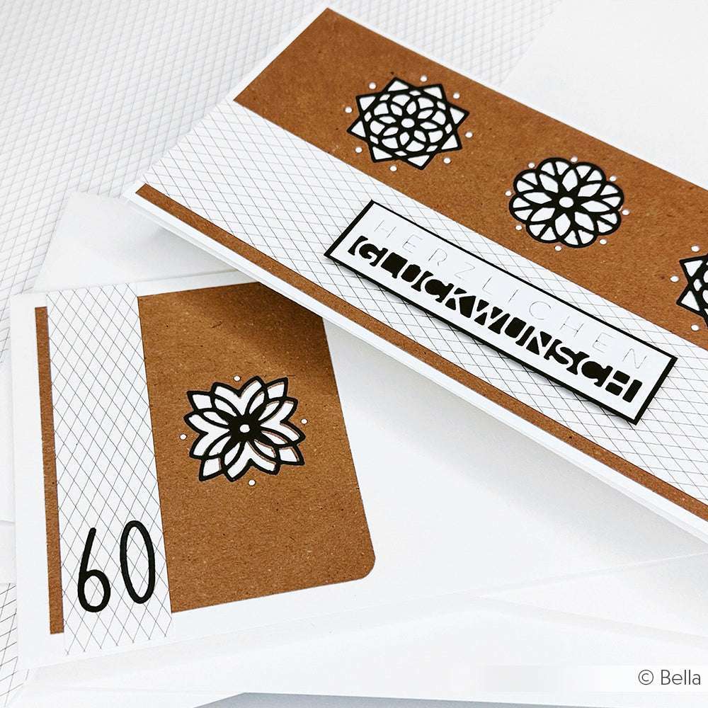 Die braun-weißen Grußkarten von Alexandra Renke sind mit schwarzen Blumenmustern aus der Motivstanze Ornament, deutschem Text und der Zahl 60 versehen.