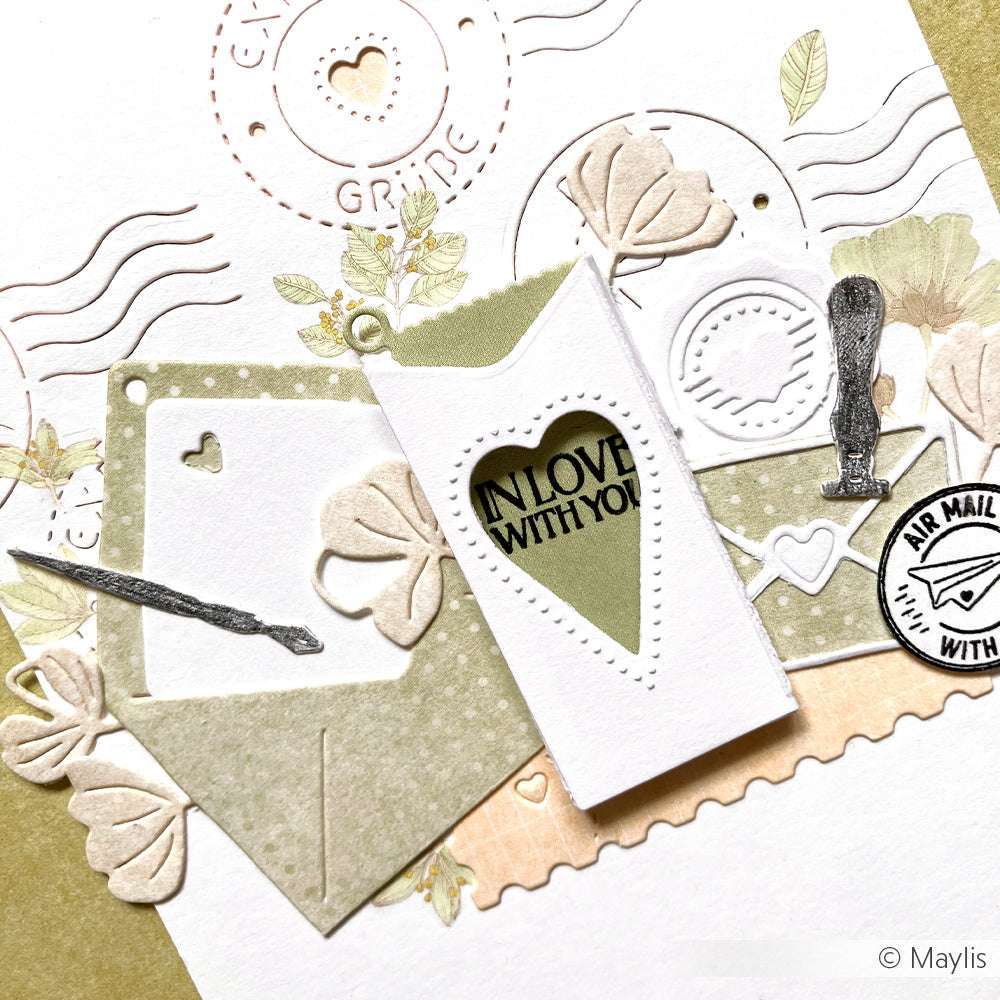 Handgefertigte Karte von Alexandra Renke mit sanften Grün- und Cremetönen, floralen Akzenten und "IN LOVE WITH YOU" in einem Herzausschnitt. Gefertigt mit hochwertigen Designpapieren und dem Motivstanze Schreiberling Set für präzise Details.