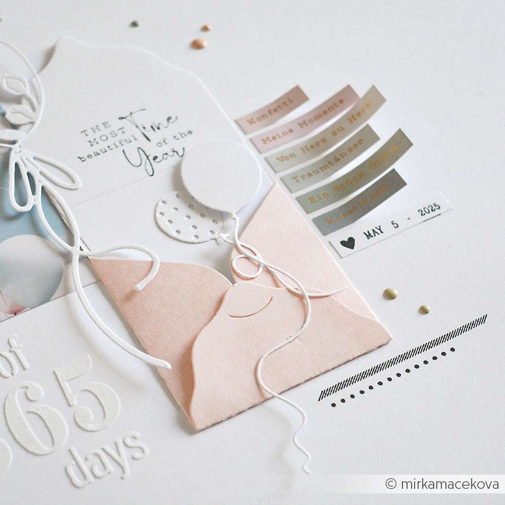 Eine pastellfarbene Scrapbook-Seite mit Alexandra Renke Motivstanze Luftballons, einer Tasche und einem Text mit Alexandra Renke PAPPcut®ies, der den 5. Mai 2025 markiert.