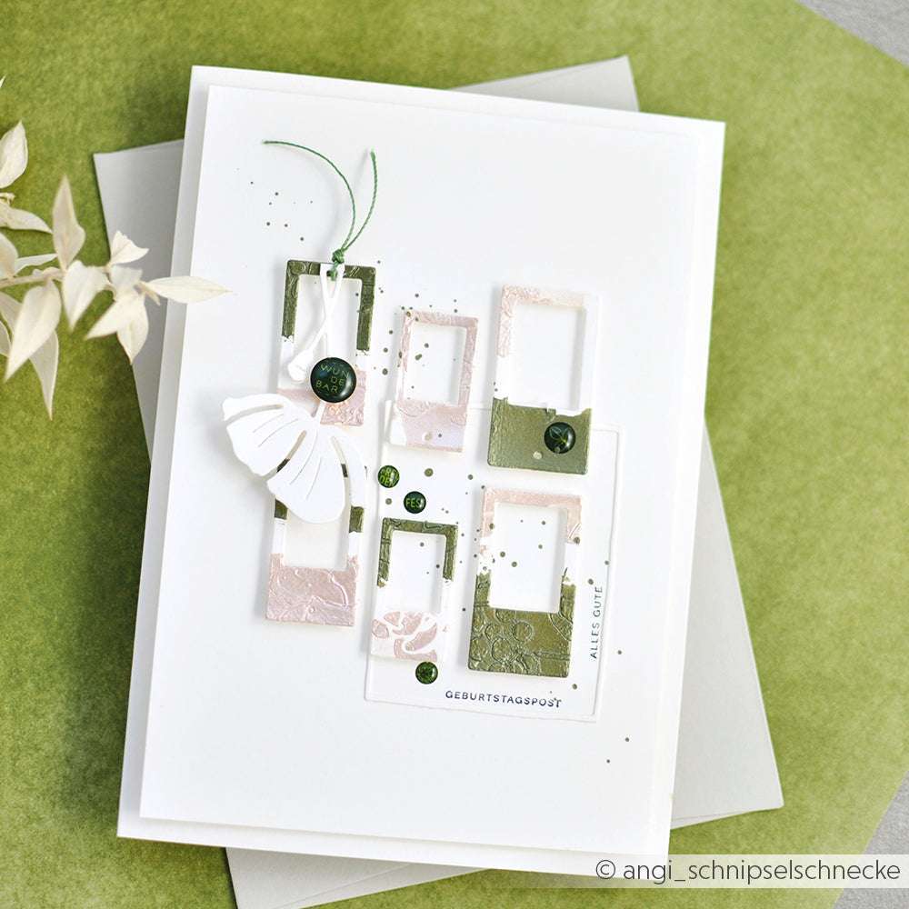 Handgemachte Geburtstagskarte von Alexandra Renke mit grünen und weißen geschichteten Rechtecken, Knöpfen und einem Schmetterling als Verzierung, hergestellt mit PAPPcut®ies und Deep Edge Motivstanzen für detaillierte Formen und ein charmantes Finish.