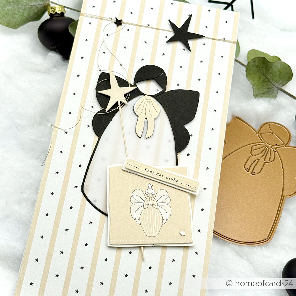 Handgemachte Engelskarte von Alexandra Renke mit einer Motivstanze großer ruhiger Engel, Sternenornamenten und einem "Fest der Liebe"-Anhänger auf einem gestreiften und gepunkteten Hintergrund - ideal für kreative Projekte mit Stanzen oder DieCut Systemen.