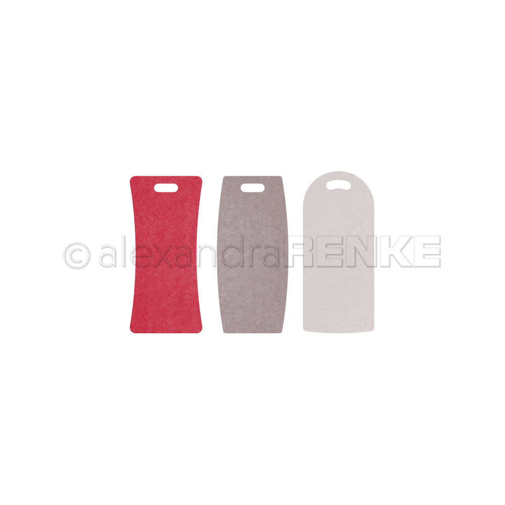 Drei Filzschilder in Rot, Braun und Hellgrau - jeweils mit einem ausgeschnittenen Henkel - heben das Alexandra Renke Motivstanze Etiketten Trio auf weißem Grund hervor.