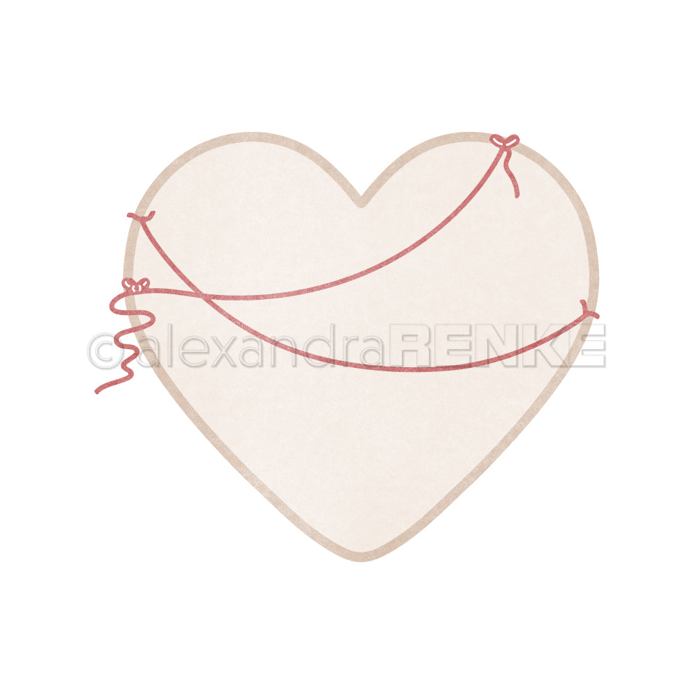 Ein beigefarbenes, braun umrandetes Herz, umwickelt mit roter Schnur auf weißem Grund - ideal für Ihre Alexandra Renke Designpapiere oder mit der Motivstanze Herz Stanzsysteme.