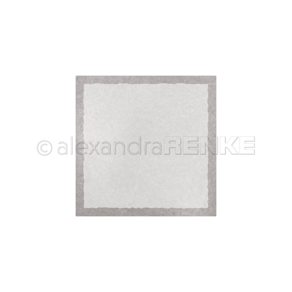 Ein quadratisches Stück weißes Papier mit grauem Rand, das mit der Alexandra Renke Motivstanze Quadrat ausgestanzt wurde, ruht auf einem einfarbig weißen Hintergrund.