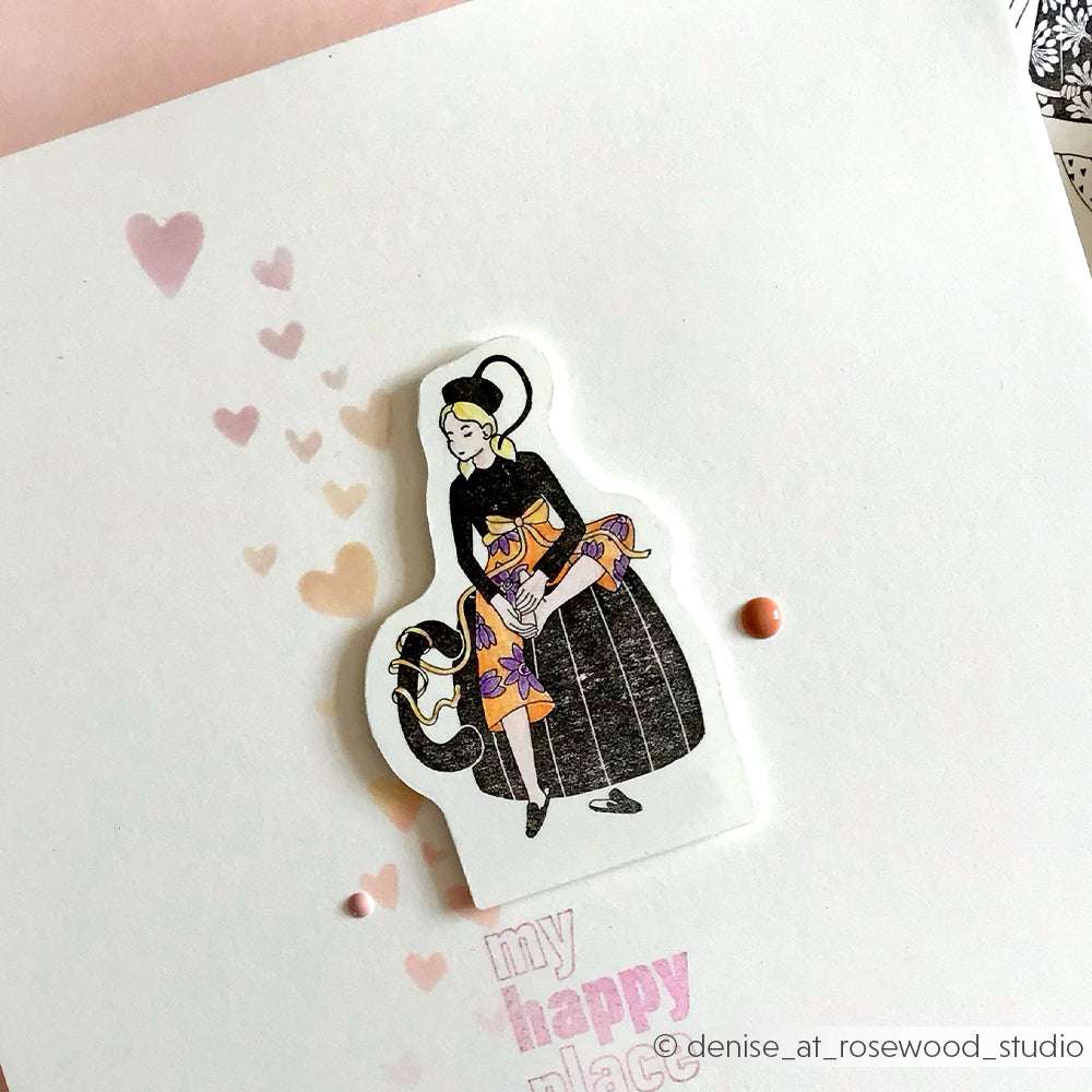 Illustration einer Frau mit einer Katze, rosa Herzen und "my happy place" auf einer weißen Karte - perfekt für Papercrafts oder zum Kombinieren mit Ihren Lieblings Alexandra Renke Holzstempeln und Stempelkissen.