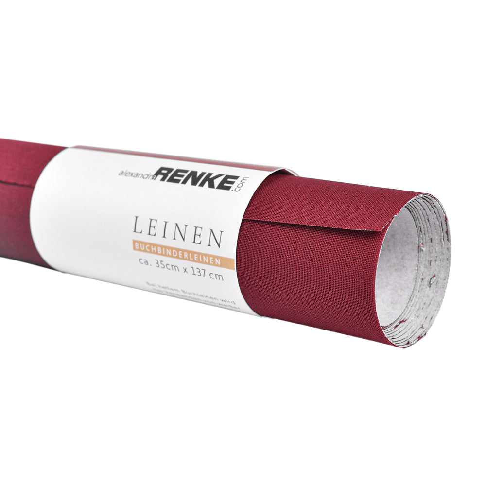 Ein 35 x 137 cm großes, gerolltes Blatt kastanienbraunes Buchleinen aus ☆ Leinen und FCS zertifiziert.