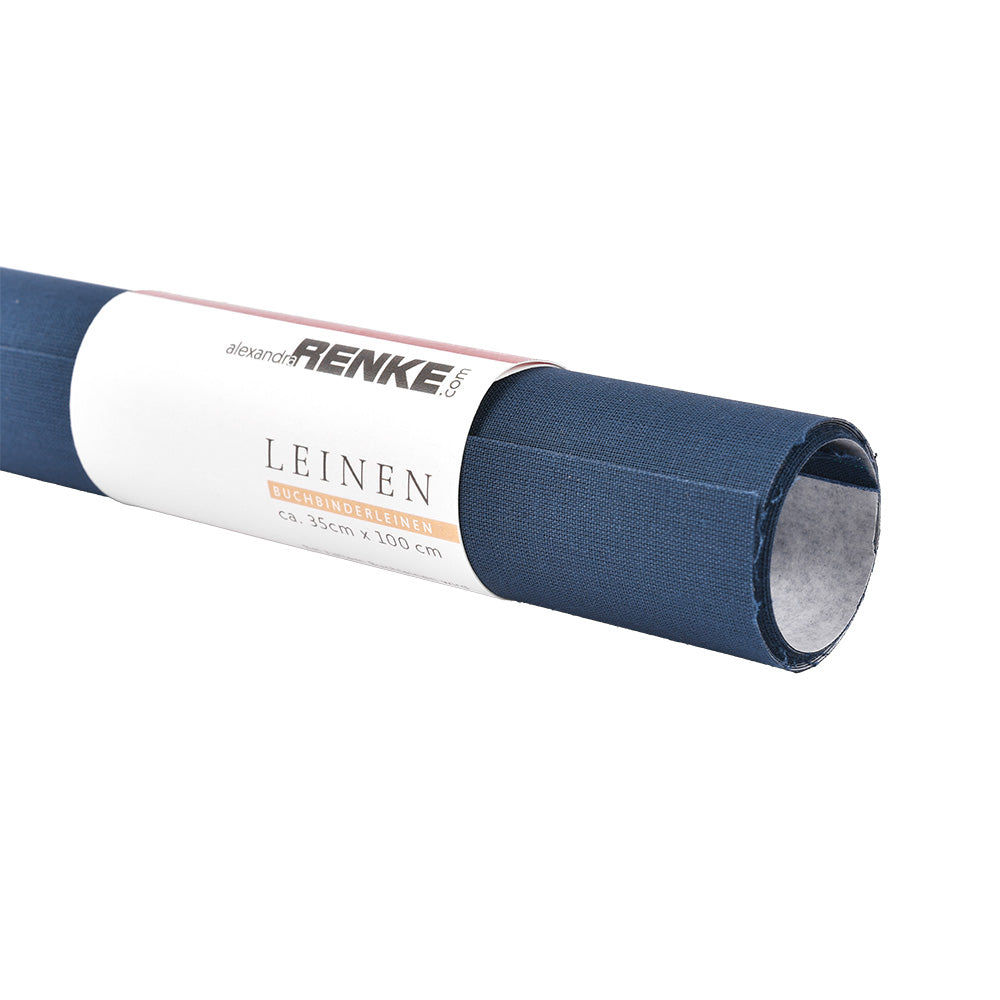 Ein aufgerollter Bogen dunkelblauer Buchleinen-Buchbinderei-Stoff aus ☆ mit einem umgebundenen weißen Etikett.