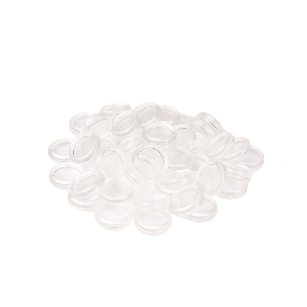 Ein Stapel kleiner, klarer, kreisrunder Bindescheiben von Alexandra Renke - ideal als Bindeelemente für Ihr Buch gestalten - ruht auf einem weißen Hintergrund.