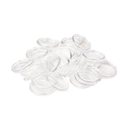 Ein Stapel klarer, runder Alexandra Renke Kunststoffringe auf weißem Hintergrund.