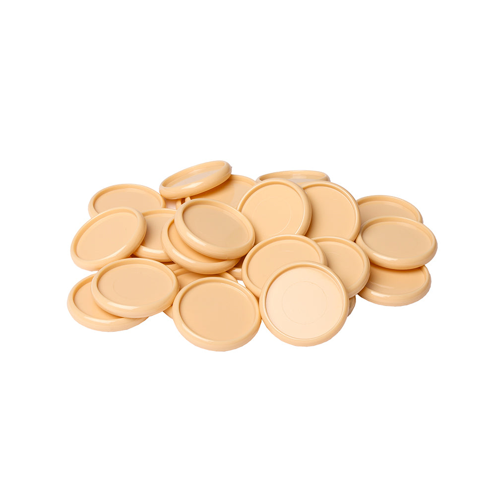 Ein Stapel beiger Kunststoff-Bindescheiben von Alexandra Renke, die als Bindeelemente für Buch binden verwendet werden, auf weißem Hintergrund.