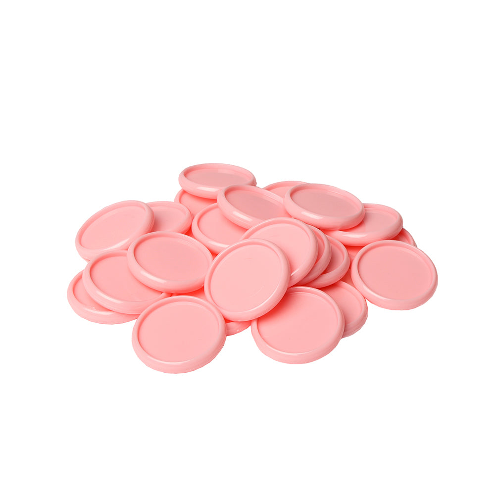 Ein Stapel hellrosa Bindescheiben von Alexandra Renke, perfekt für Buchbindungsprojekte, dargestellt auf weißem Hintergrund.