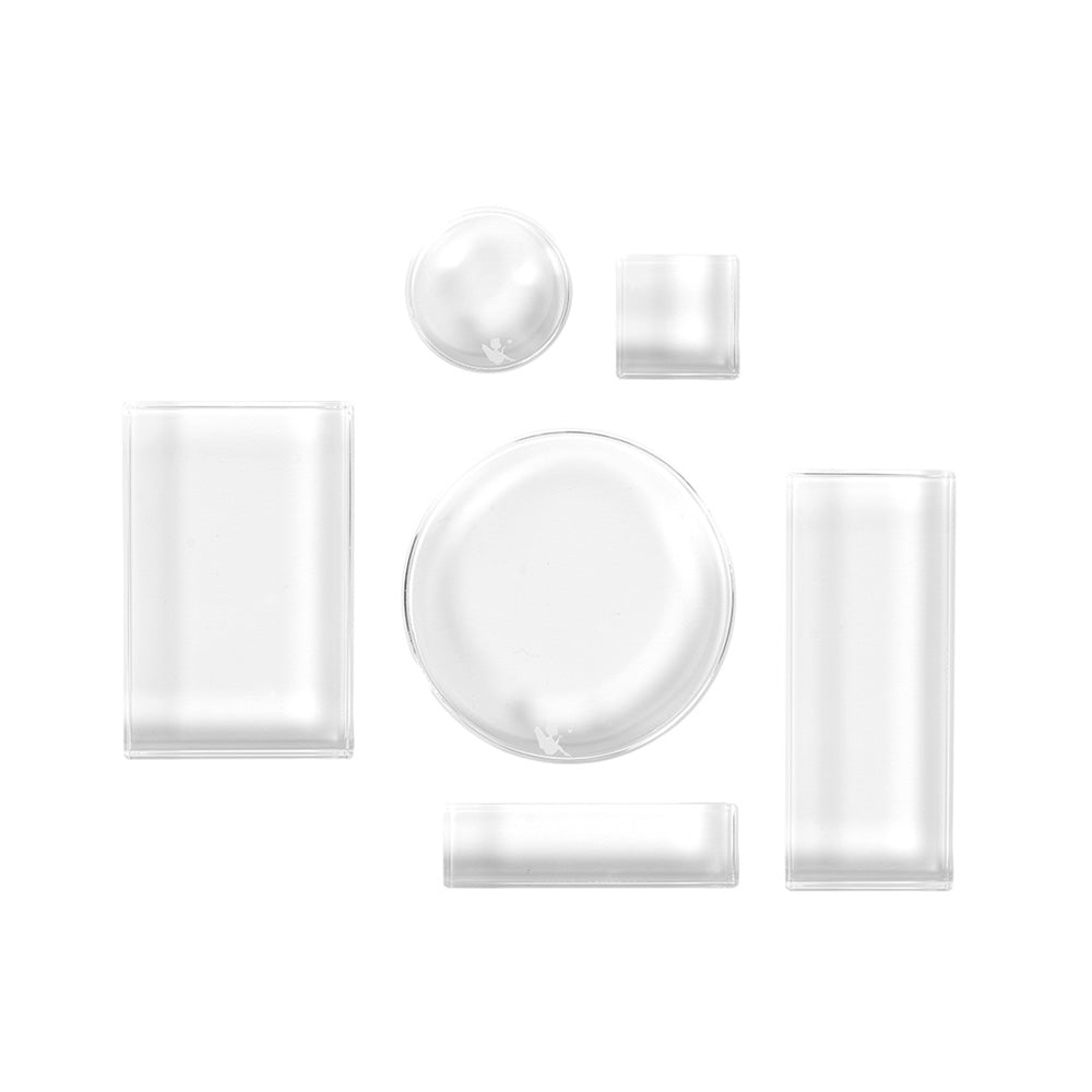 Sechs Alexandra Renke Acryl Stempelblöcke in verschiedenen Formen und Größen sind auf weißem Hintergrund abgebildet - ideal für jedes Bastel- oder Stempelfeld-Projekt.