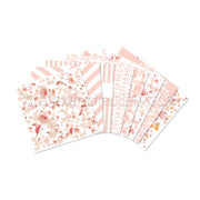 Sechs Bögen rosa und weiß gemustertes Papier von Alexandra Renke mit Blumen-, Streifen- und Buchstabenmustern, aufgefächert - perfekt, um Ihr nächstes Projekt kreativ zu gestalten.