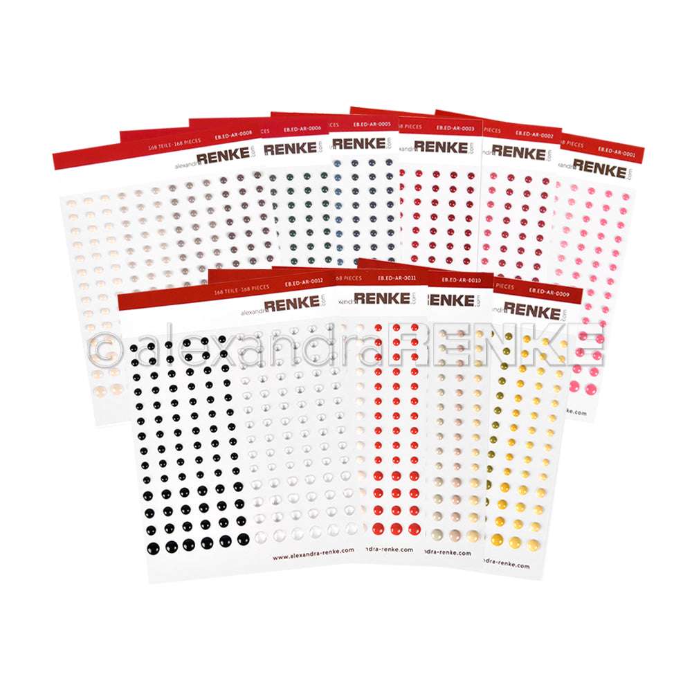 Neun Blätter aus der Kollektion farbiger Klebeperlen von Alexandra Renke sind auf weißem Hintergrund schön aufgefächert - perfekt, um die Kreativität bei Ihrem nächsten Projekt zu entfachen.