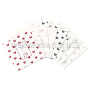 Ein festliches Bündel von sieben Alexandra Renke-Bögen mit roten Schleifen, Schneeflocken und Tannenbaummotiven, die fächerförmig angeordnet sind - ideal, um Ihre Weihnachtssammlung kreativ zu gestalten.